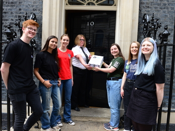 Wildlife Trusts youth ambassadors hand in the Environment Act Targets petition, signed by over 60,000 supporters