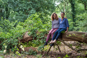 Mother and daughter in a woodland
