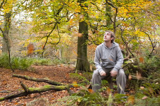 Man in woodland