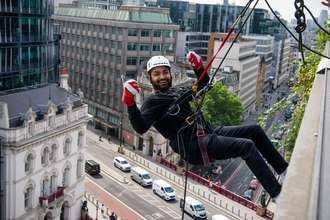  Hogan Lovells colleagues abseiling down their London office building, raising money to support The Wildlife Trusts!