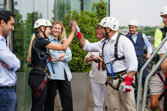 Hogan Lovells colleagues abseiling down their London office building, raising money to support The Wildlife Trusts!