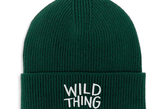 A dark green beanie hat embroidered with Wild Thing along the rim