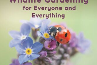 The cover of Wildlife Gardening for Everyone and Everything featuring a ladybird resting on some forget-me-nots