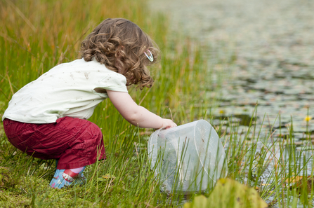 Young girl with bucket Ross Hoddinott/2020VISION