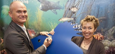 Simon King OBE signing a scale with Joan Edwards 