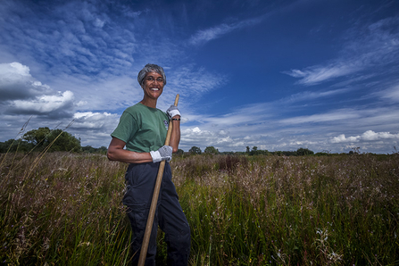 Volunteer stands in the grassland