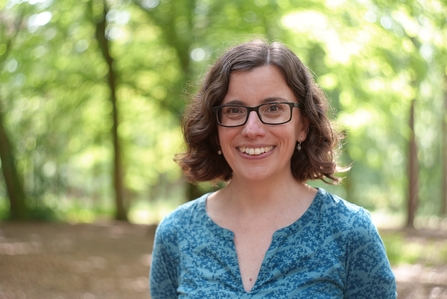 Kathryn Brown, The Wildlife Trusts Director of Climate Action, smiles at the camera
