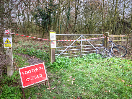 The entrance to Calvert Jubilee nature reserve closed by HS2 in 2020, with a 'footpath closed' sign and red and white tape