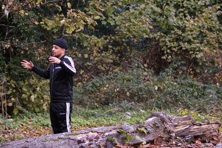 A man conversating next to wildlife
