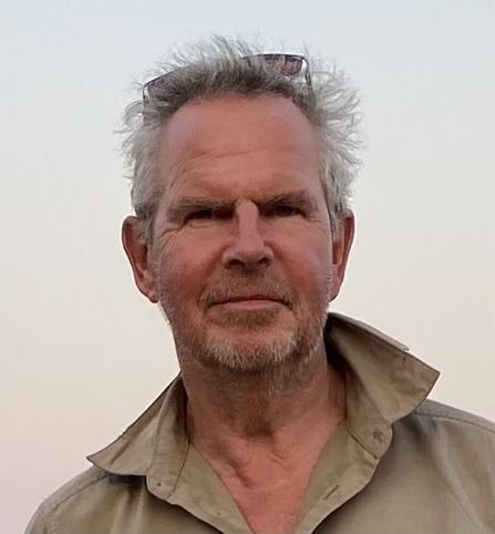 A head and shoulders shot of David Jordan, smiling slightly at the camera