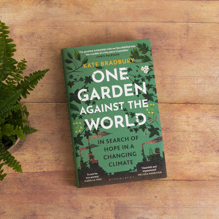One Garden Against the World by Kate Bradbury on a table with a furn