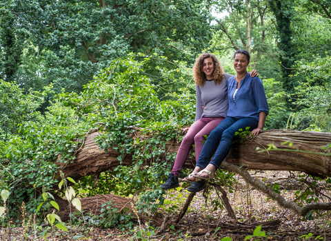 Mother and daughter in a woodland